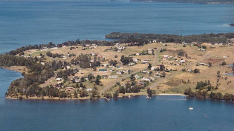WHAT A SPOT: An aerial photo of the village of Coomba Park captured in 1992. 