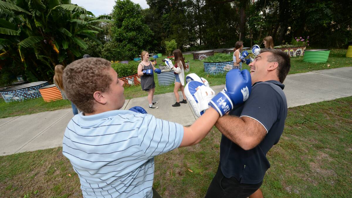 TAKING LEARNING OUTSIDE: Great Lakes College year 10 student Jason Clark takes part in some outdoor boxing with school chaplain Andy Jones as part of the 
College Connection program. 