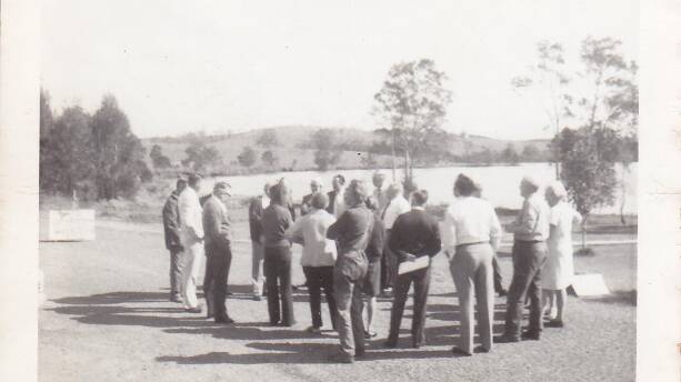 THE WHOLE MOB: In 1974, this photograph captured the entire population of Coomba Park, six of whom established the progress association, which is the longest serving progress association in the Great Lakes Shire. New members were lured in with a frozen chook and a book of raffle tickets