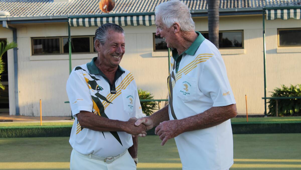 GREAT GAME: The champs contesting the major singles title, Dennis Lawler and Rob Studdert shake hands after Lawler (at right) takes out the game. 