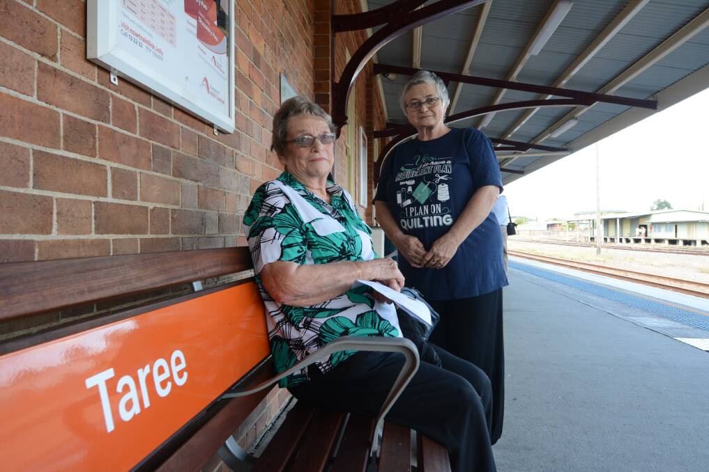 Determined to fight. Joan Lawler (left) and Pat Welna are opposed to proposed NSW government changes to Taree Railway Station operating hours and staffing. Today they rallied with more than 150 people at Taree Railway Station to protest the NSW TrainLink review of regional services.