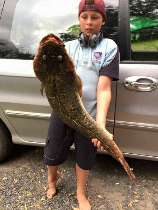 KEEN FISHERMAN: Thirteen-year-old Joel King, Kathy Stow’s son, caught this 92cm flathead with his bare hands.