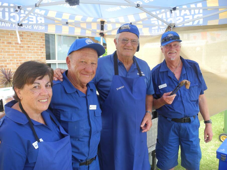 Chris Christou (third left) with Lesley Rudd, George Wallington and David Dunne. They were on the barbecue at Marine Rescue Forster Tuncurry's water safety awareness day.