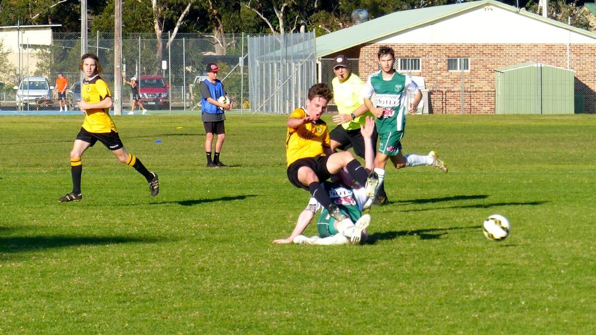 PHYSICAL ENCOUNTER: Jaidyn Kianou gets upended in the first grade match.