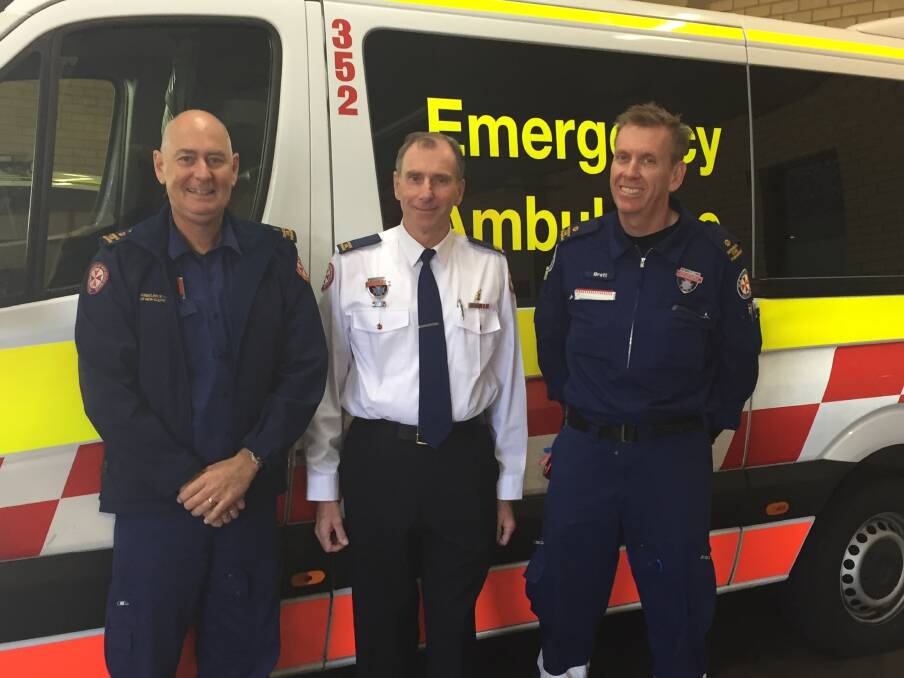 Tuncurry Ambulance Station inspector Ian Dwyer, Rotary NSW Emergency Services Community Award nominee Steven Martyn and station officer Brett Campbell. 