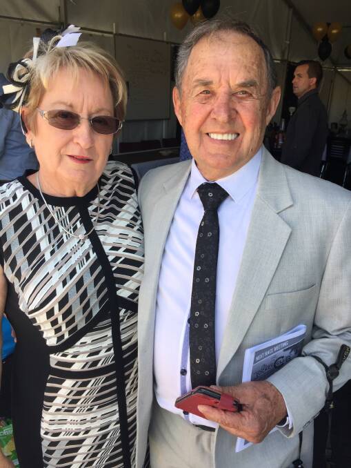 Special guest: Margaret McQuillan with former jockey and trainer Neville Voigt at last Friday's race meeting. Photo: Jeanene Duncan.