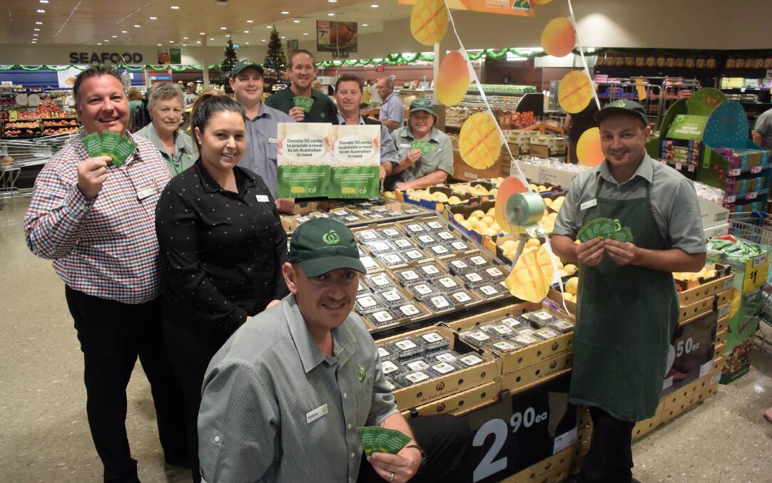Helping the hungry: Woolworths' Craig Feuz, Lorraine Lowe, Amie Walker, Luke Williams, Matthew Cloak, Phil Lohse, Beau Blanch, Toni Ericson and Adam Abbott launched the appeal at the Taree store. 