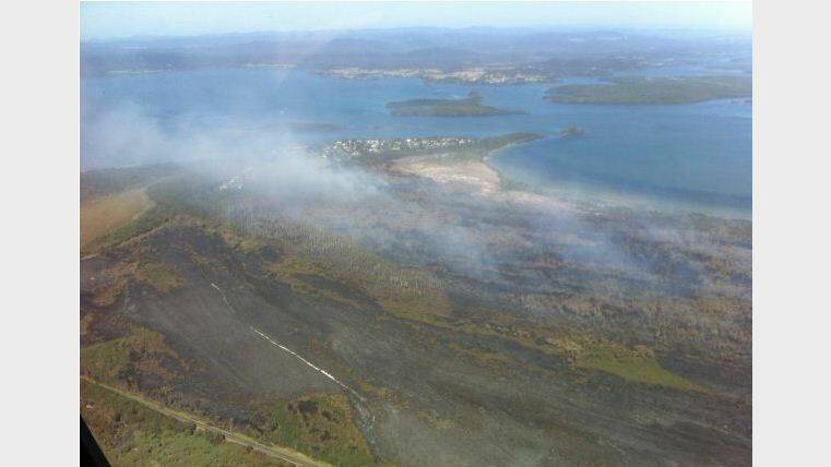 The morning after: The Janies Corner fireground from the air. Pic: NSW RFS