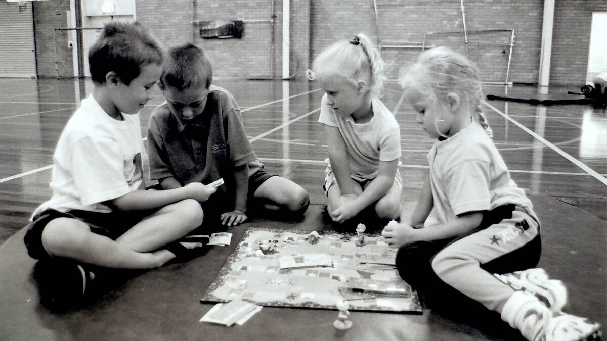 THROWBACK THURSDAY: Playing the rug rat game at the YMCA vacation centre, Jack Katen, Matthew King, Leah Newell and Taleesha Easton.