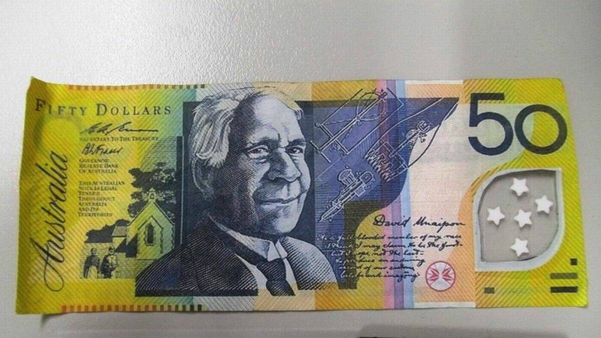 FAKE MONEY: This is one of the two fake $50 notes a customer used at a Coolongolook service station recently. 