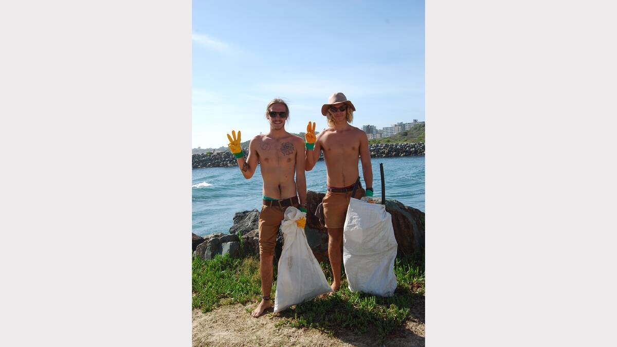 INSPIRED: Brothers and Tuncurry locals Shannon and Cade McConnell helped out with the clean-up near the rock wall on Friday.