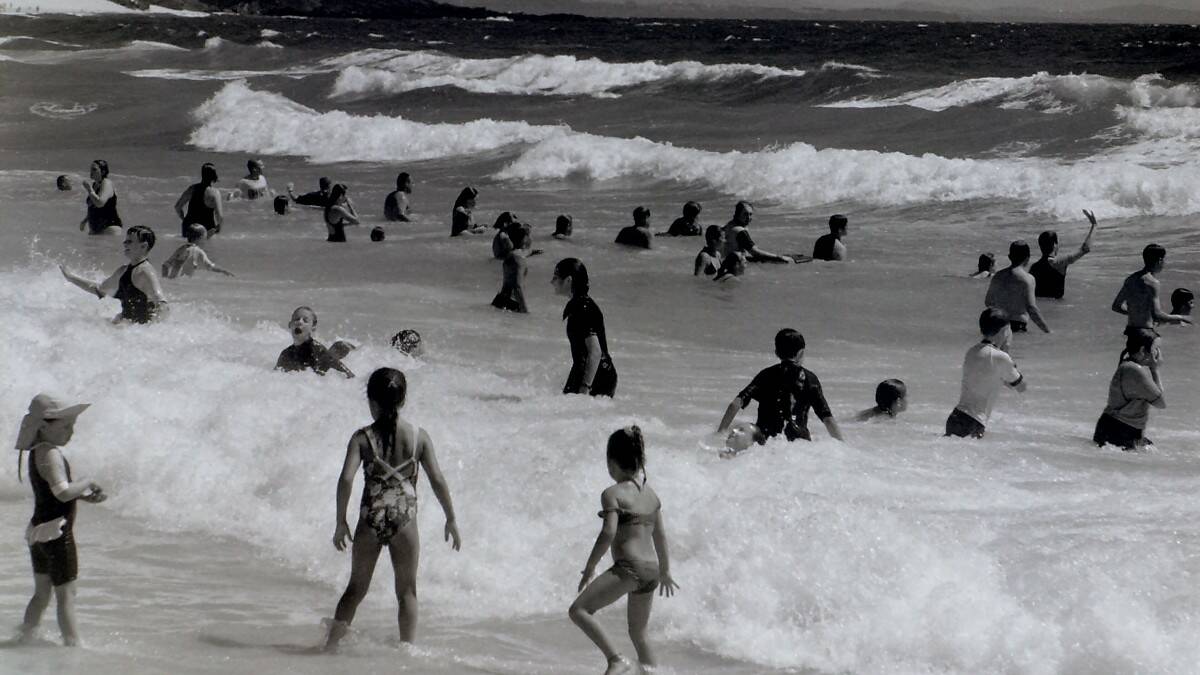 THROWBACK THURSDAY: Holiday makers enjoy the surf at One Mile Beach in January 1998.