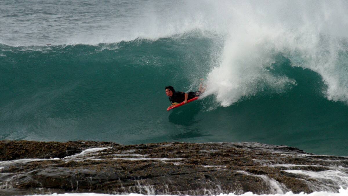 THROWBACK THURSDAY: Chris Cheers enjoying a wave at Hayden’s Reef during recent big swells. This picture was from The Advocate’s Wednesday, March 24 edition back in 2004. Pic by Shane Chalker.