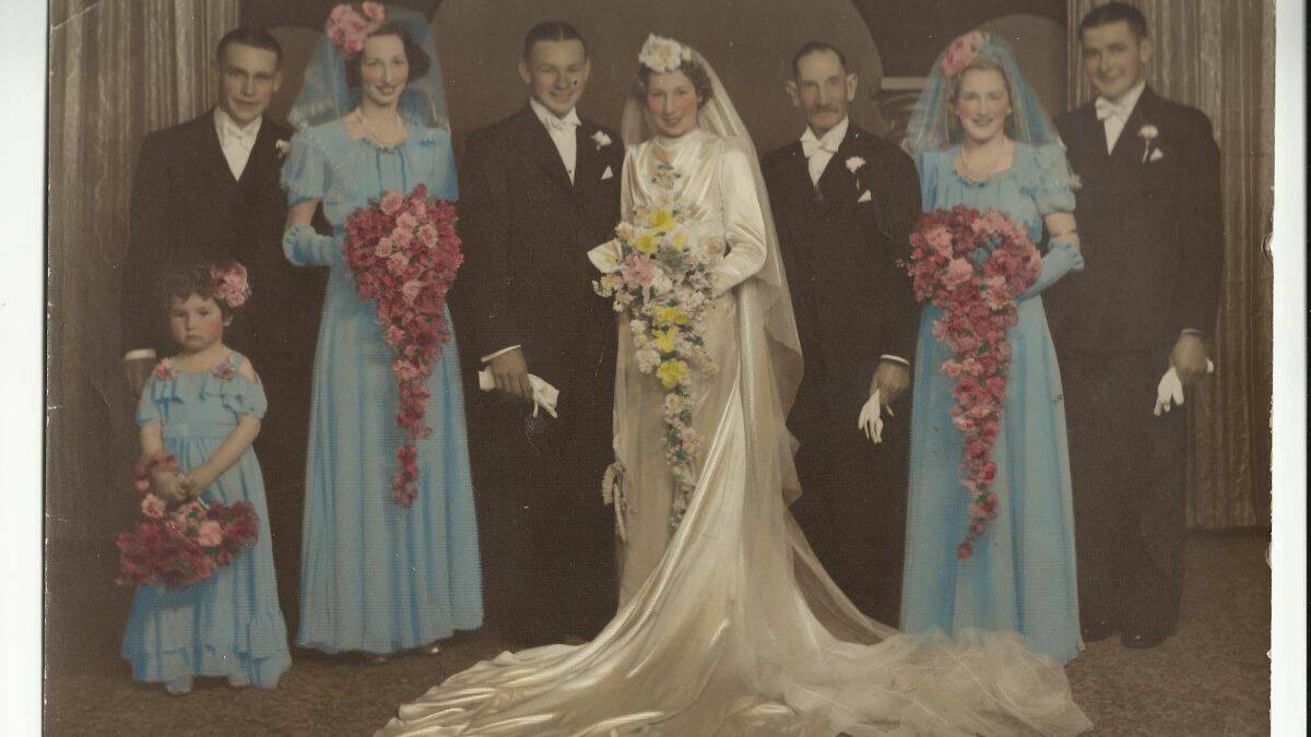 WEDDING DAY: Dorothy and Claude Hudson in their wedding party.