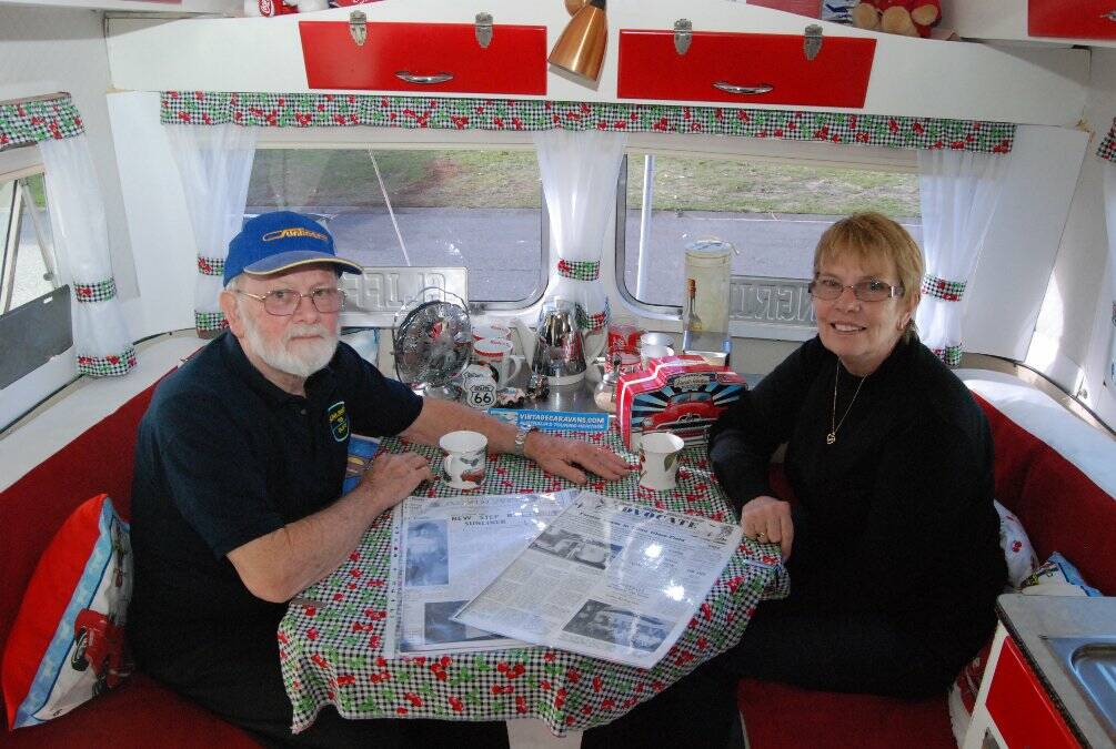 LIKE FINDING GOLD: Cliff and Ingrid Pallister in their 1964 Sunliner caravan that was built in Forster.