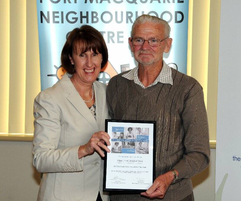 Member for Port Macquarie Leslie Williams presents Ted Bickford with his Mid North Coast Citizen of the Year Award in Port Macquarie last week.