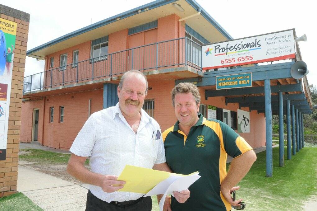 LOOKING TO THE FUTURE: John Quinn and Brian Wilcox with the plans for the Forster Surf Lifesaving Club.
