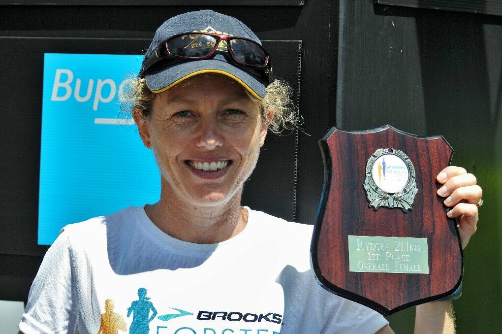 ON TO CANBERRA: Forster's Mary Yule prepares for the Canberra marathon with a win at Port Macquarie.