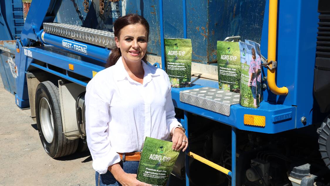 Aus Blue Bins Midcoast CEO, Erin Matthews displaying recycled gypsum at the ABB Coolongolook site. Picture by Rick Kernick.