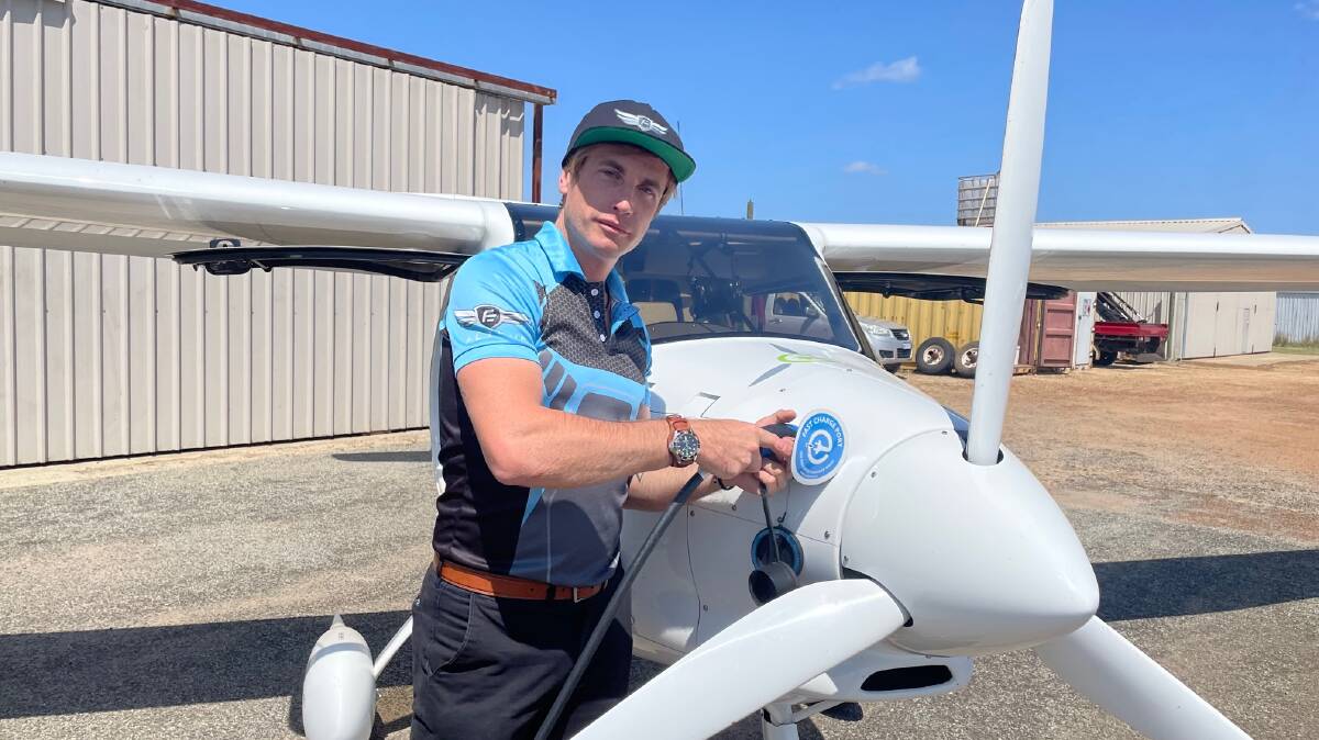 Pilot Korum Ellis uses a charging station at Murrayfield airport near Mandurah in Western Australia's Peel region to recharge his electric aeroplane. Picture by Samantha Ferguson 