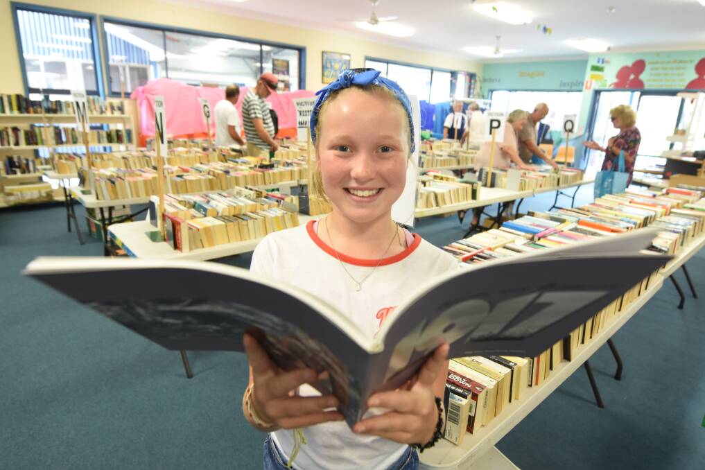 Something for everyone: Charlotte Fitzgerald from Sydney at the Rotary Book Fair at the Forster Holy Name School.