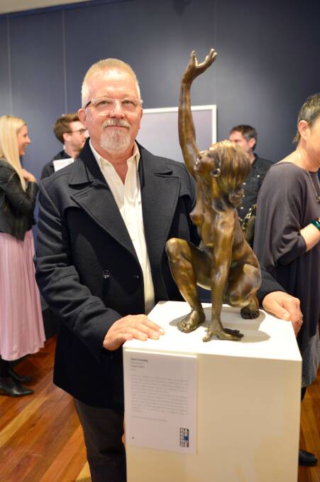 Finalist: Sculptor Cam Crossley with his work at the official opening of the Naked and Nude 2019 exhibition at Manning Regional Art Gallery. Photo: Julie Slavin.