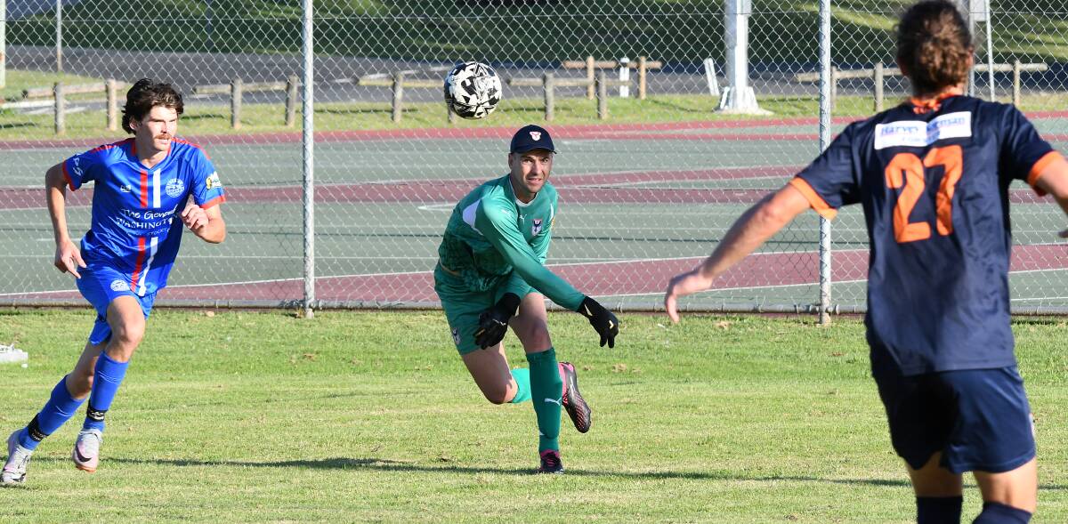 Goal keeper Rhys Dawes gets the ball back in play during the clash against Stockton at Boronia Park. The visitors won 2-1.