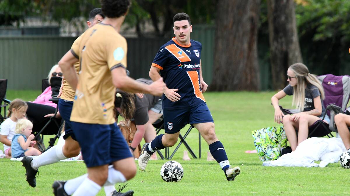 Southern United's Jake Camilleri looks to test the New Lambton defence in the opening game of the Newcastle Zone 2 football season. The Ospreys play Stockton on Saturday at Boronia.