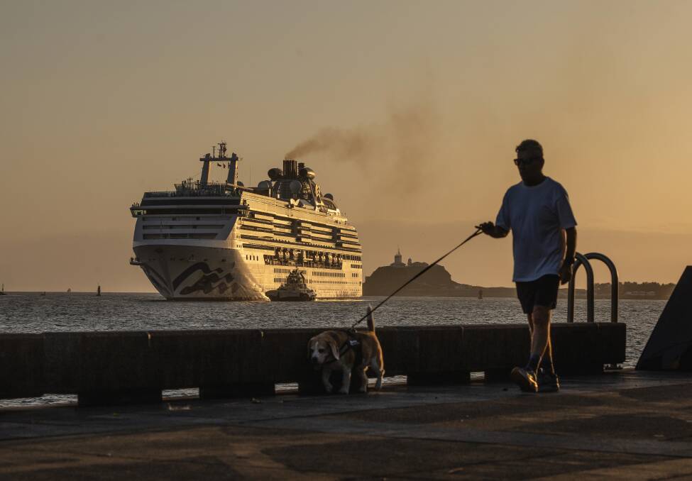 The Coral Princess cruise ship was guided into Newcastle Harbour at sunrise earlier this year. Picture by Marina Neil