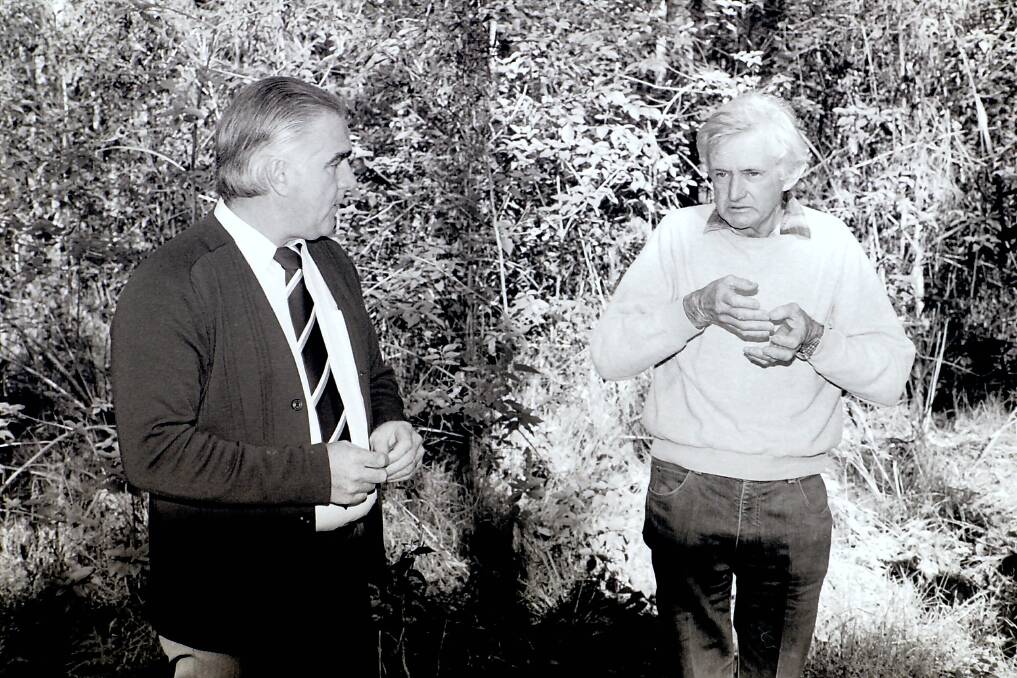 July 1987: Taree detective Sergeant Warren Thompson with Trevor Young in Kiwarrak Forest where the body was found.