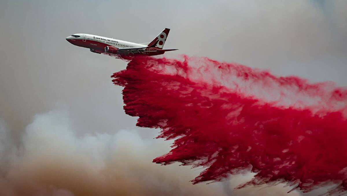 The RFS's 737 dropping retardant at Hallidays Point at the weekend. Photo by Aidan Keane