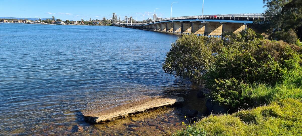 Cement remains on the Forster side are remnants of the ferry landing site today, with the Forster Tuncurry Bridge visible in the background