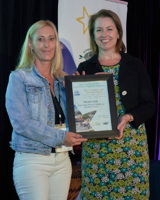 Representing the women's shelter, Tammy Callaghan from the Midcoast Council who received the award from Exchange for Change, the scheme co-ordinator for Return and Earn, CEO, Janelle Neath.