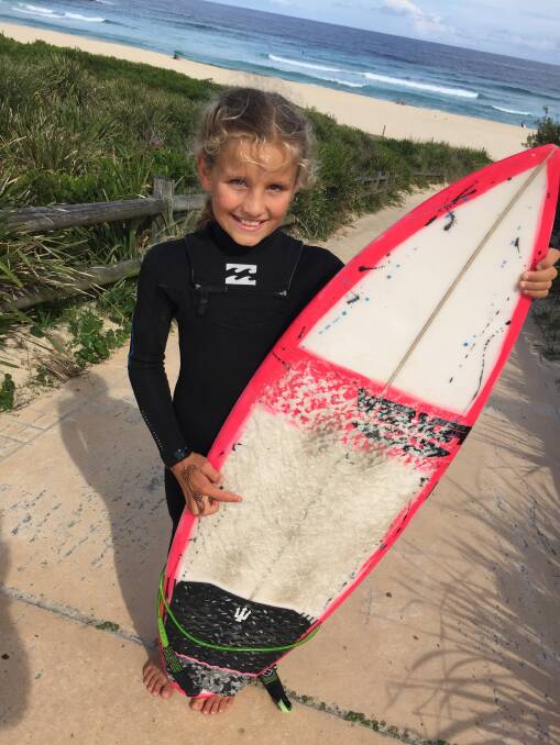 Pint-sized boardrider heading for big waves