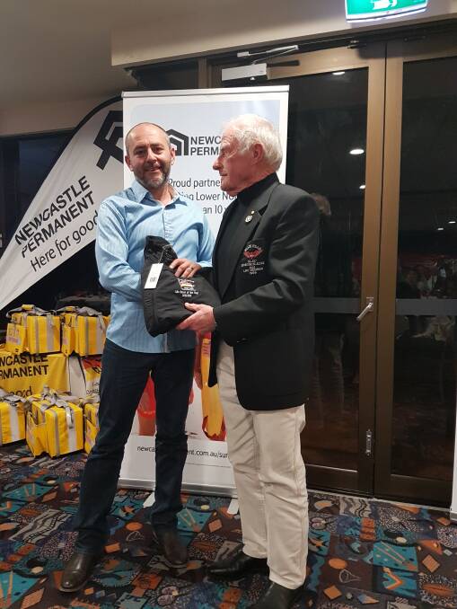 Lifesaver of the Year Jerrad Allen being presented with his award by SLSLNC Life Member John Edstein OAM.