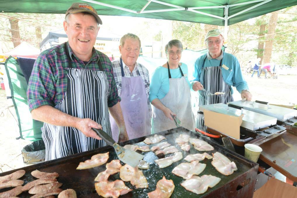 It's great news for community markets which have been given the go-ahead to reopen, with a COVIDsafe plan in place. Norm Maberly-Smith, Bob Taylor, Donna Green and Allan Buckingham from the Hallidays Point Senior Citizens cooking up a storm at Black Head Bazaar.