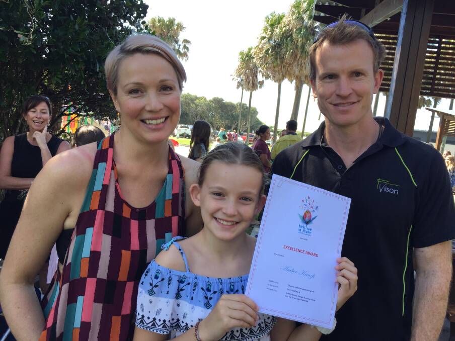 Proud parents, Melinda Moncrieff and Raphael Kunzli with Amber Kunzli, who received an excellence award for her story in the 2017 competition.