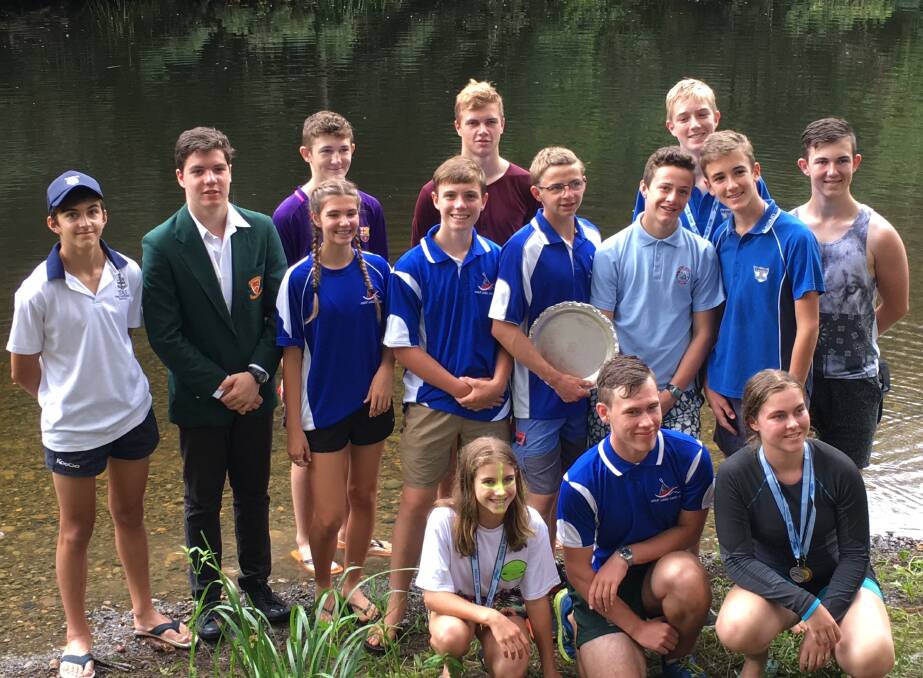 The complete NSW schools team with the National small competitors’ Schools Trophy won by Great Lakes Colleges.
