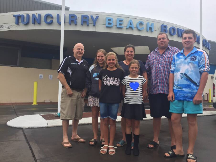 The Worrell family, Giaan, Alica, Megan, Sophie, Gary and Bradley, with Tuncurry Beach Bowling Club general manager, Terry Green will take home lasting memories and friendship of their stay in the Great Lakes.