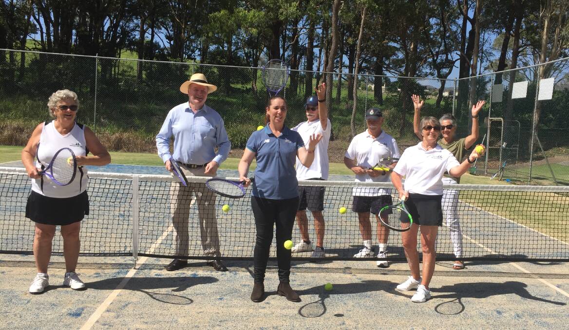 Celebrating the newly surfaced tennis courts, Sharon Andrews, local member, Stephen Bromhead, Tennis NSW's Kylie Hunt, John Mead, Keith Skipper, Lyn Skipper and Milica Mead.