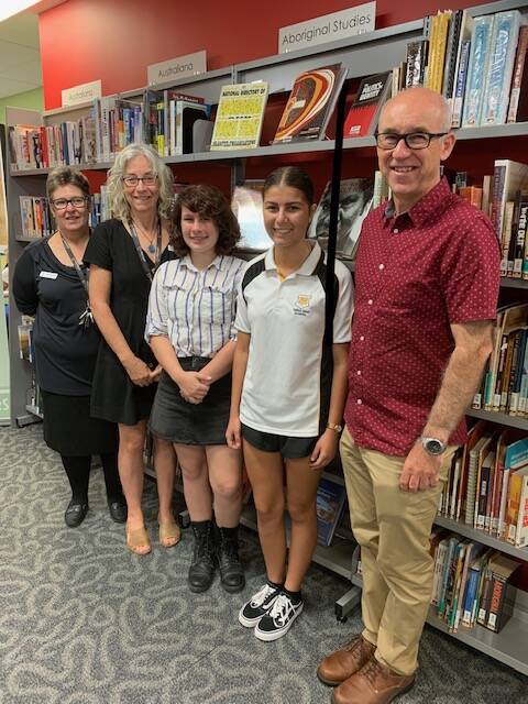 MidCoast Council Library staff members, Lisa Greenwood and Debbie Horgan with trainees Lillie Fuller and Janaya Mitchell and libraries manager Chris Jones.