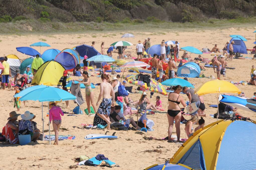 Lifesavers remind beachgoers to social distance
