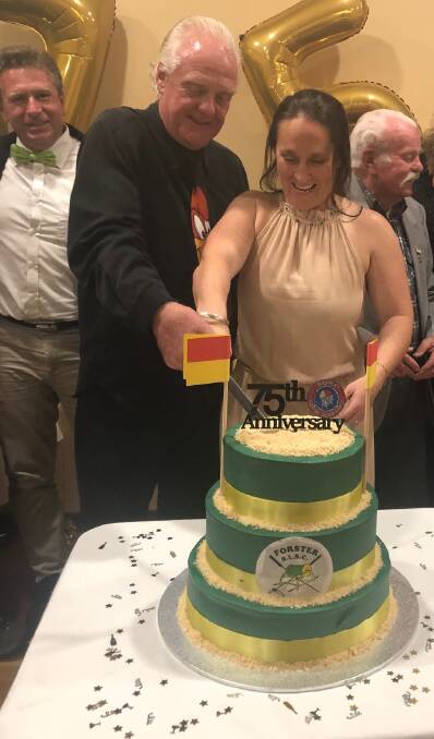 Beth Lee and Rob Chappell had the honour of cutting the cake.