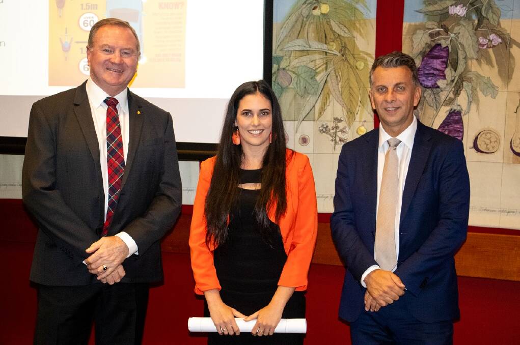 Shelley is congratulated by Member for Myall Lakes, Stephen Bromhead and Minister for Transport and Roads, Andrew Constance. 