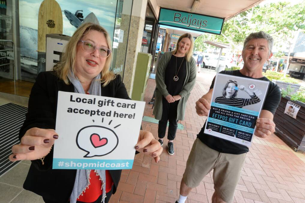 Wharf Street, Forster retailers, Sitting Wombat Bookshop owner, Dianne Steel, Manning Shoes manager, Renee Peter and Saltwater Wine manager, Ross Dreise. Cards can be redeemed at these outlets and more than 100 throughout the Mid Coast.