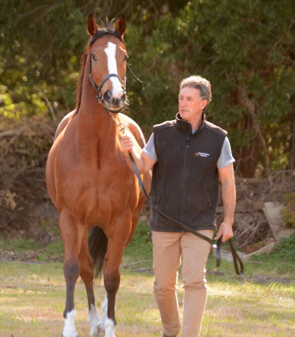 Tuncurry trainer, Terry Evans with the Mid North Coast horse of the Year, Arise Augustus.
