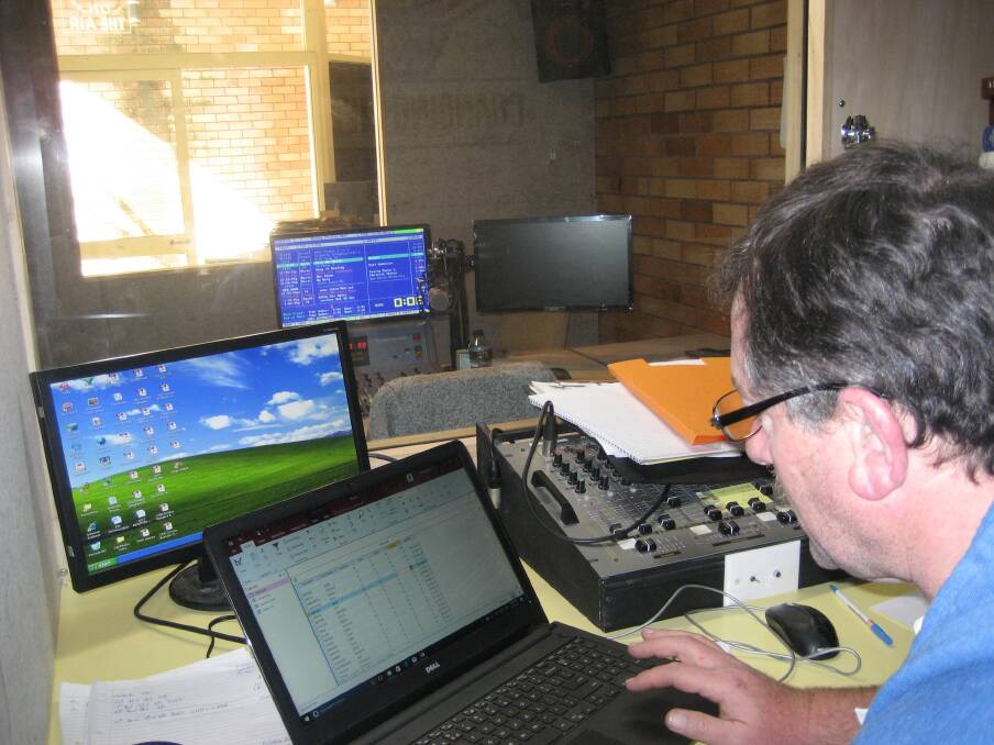  Station manager Mark Spencer hard at work in the production studio.