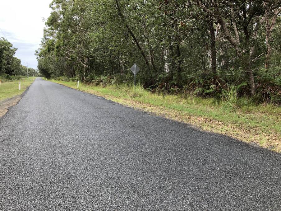 The narrow, unmarked Green Point Road was the villages' only access in and out of the community, and the development was a recognised bushfire prone area.