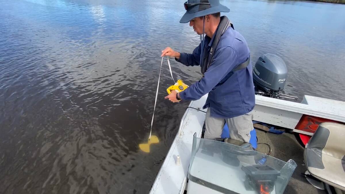 Environmental Technician with the Department of Planning, Industry and Environment, Michael Orr undertaking water quality monitoring on the Manning River as part of the annual Waterway and Catchment Report Card.