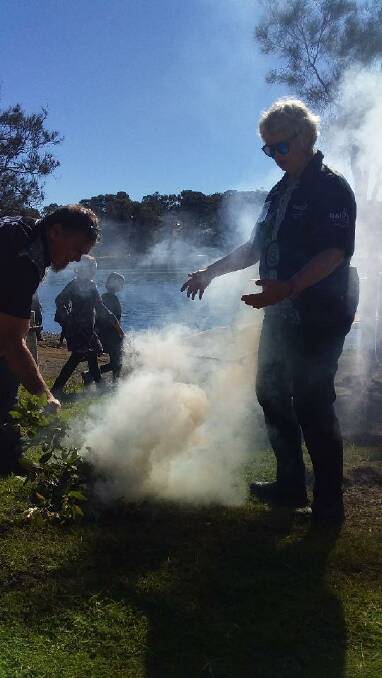 Steve Brereton begins the smoking ceremony welcome at Coomba Park.